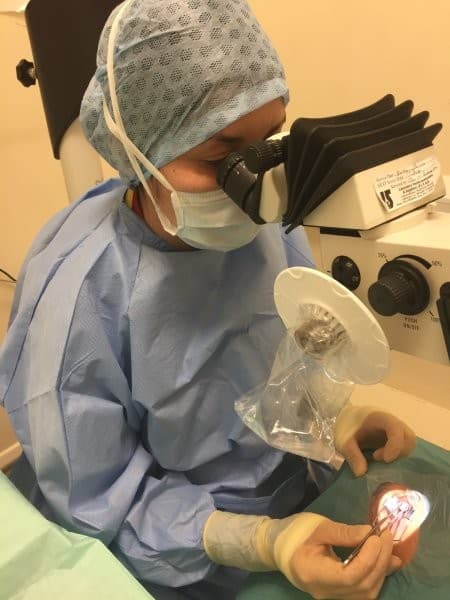 A nurse performing a CXL procedure