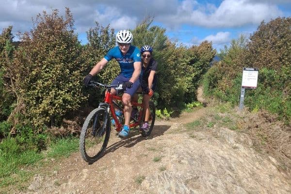 Champion supporter backs low-vision athlete