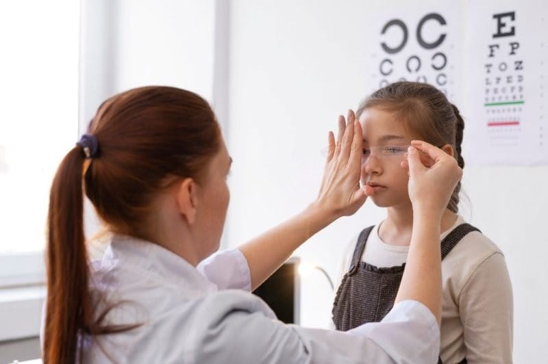 doctor testing patient eyesight