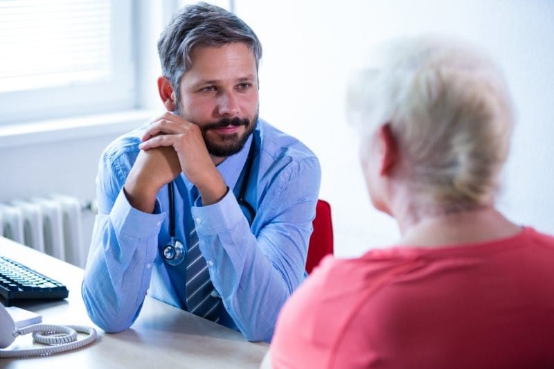patient consulting doctor small
