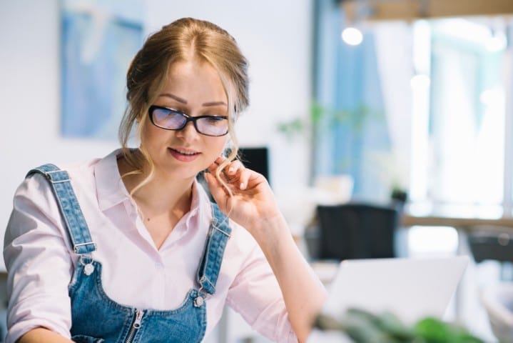 woman glasses working office