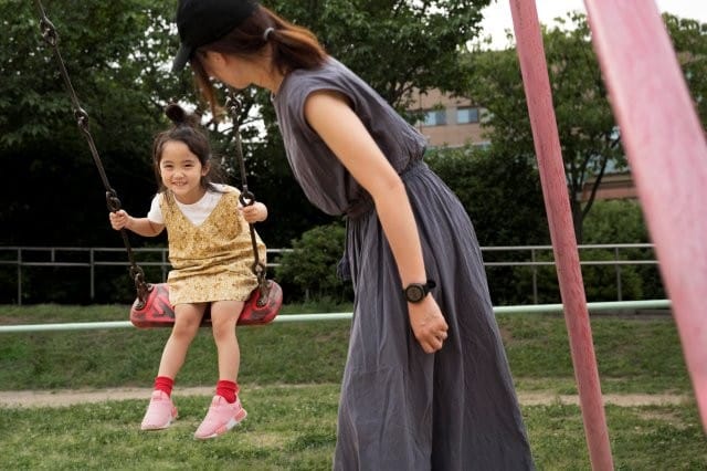 mom playing with her daughter small
